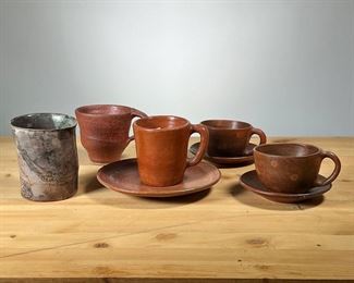 (5PC) MEG SMEAL ART POTTERY CUPS | Including a pair of cups with saucers, a single small mug with saucer, and two other cups. - h. 4 in (tallest)