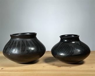 (2PC) SAN ILDEFONSO-STYLE BLACKWARE VESSELS | Two Native American black pottery, San Ildefonso style, pots with designs, apparently unsigned. - dia. 6.5 in (largest)