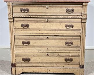 EASTLAKE MARBLE TOP CHEST | 19th century Eastlake dresser in old cream paint with brown marble top.  Four drawers with original hardware. - l. 40.5 x w. 18.5 x h. 38.5 in