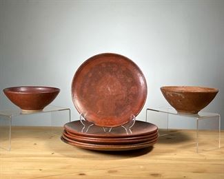 (8PC) BROWN POTTERY DISHES | Including five plates, a smaller plate, and two bowls Signed Ducvale, Nicaragua 2011 Meg Smeal.  - dia. 11 in (larger plates)