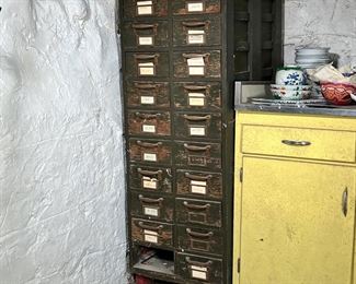 REMINGTON RAND GUARDSMAN FILE CABINET | Remington Rand Guardsman Card Catalog Cabinet. In worn old green paint and having 20 small drawers (one missing) 1930's-1940's the green paint in Remington Rand confirms Military use. - l. 25 x w. 19.5 x h. 51 in