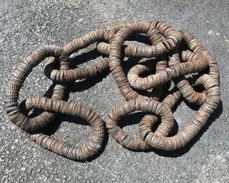 FOLK ART BOTTLE CAP CHAIN SCULPTURE | Folk/Tramp Art Vintage Bottle Cap Chain comprised of 9 links. -  l. 59 x w. 4.5 x h. 1 in
