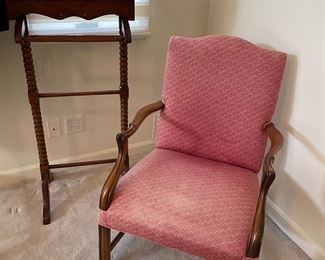 armchair and clothing valet stand