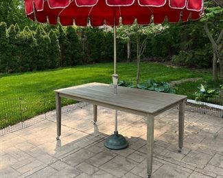 Patio table (on casters) and round red umbrella with stand