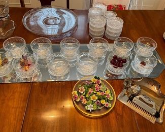 Crystal sherbet bowls, glass cherries, porcelain name card holders, crystal glass holders, silver-plated crumber, and more!