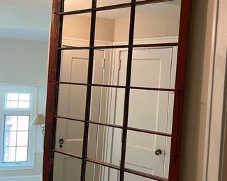 large red multi-paned mirror