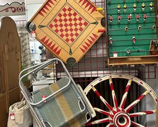 Wagon wheel! Vintage games! Chairs! Rugs! 