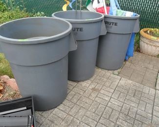 3 60 Gallon Trash Cans used to catch water