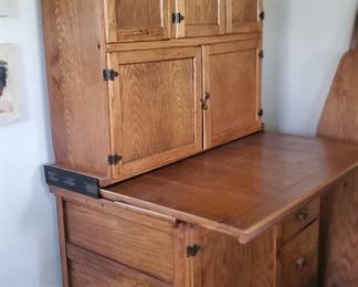 Hossier cabinet with flour sifter and pull out counter top
