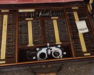 vintage optometrist suitcase full of test lenses