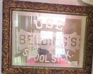 Advertising sign etched in glass