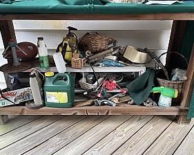Shelves of Gardening Tools, Hoses, Sprinklers, Chemicals, Etc.