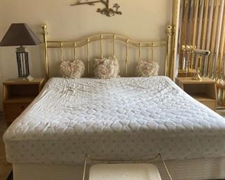 Another king size bed with brass headboard