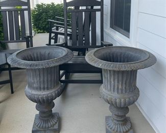 Pair of cast iron fluted planter urns 