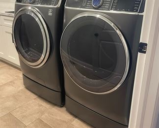 Less than a year old! GE profile front load washer & dryer 