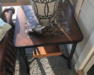 Tile top table and vase