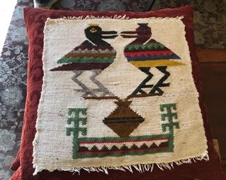 Woven bird panels applied to pillows.  There are two