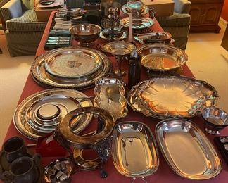 Various silver plated, and some sterling serving dishes.