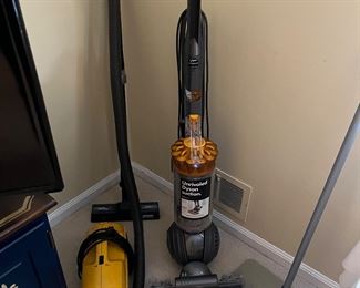 Dyson upright vacuum cleaner.