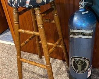 Nautical stool and dive tank. 