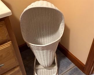 Fun white wicker hamper. 