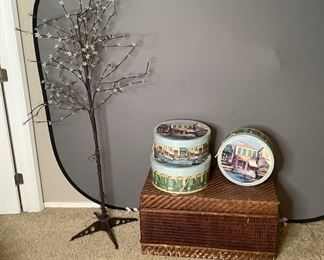 Home Decor Including Lit Tree, Trunk, and Hat Boxes