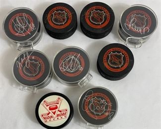 NFL Signed Game Pucks