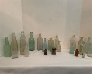 Vintage Embossed Glass Bottle Grouping
