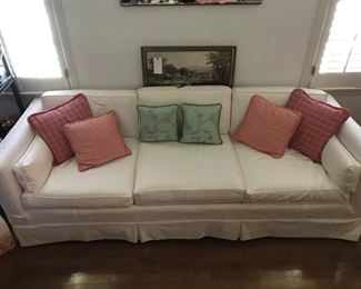 Long gorgeous slip covered sofa