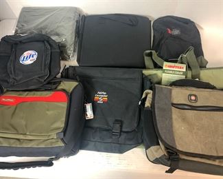 Storage Bin Filled with Wide Assortment of Bags, Backpack & Coolers