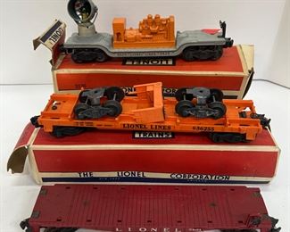Lionel No. 3520 Operating Searchlight Car, 6362 Rail Truck Car and 6801