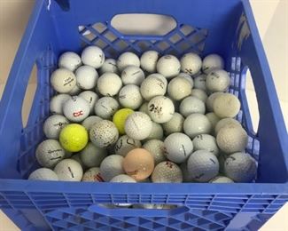 Milk Crate Filled with Mostly Used Golf Balls