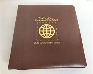 Notebook with First Day Cover Stamps from Around the World