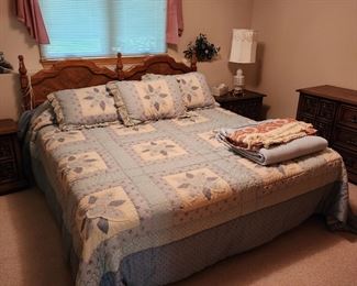 King size select comfort pillow top bed with beautiful headboard and footboard.
