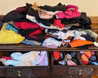 Large Unsorted Collection Of Womens Clothes: Tops, Robes, Dancewear, Socks, Slips & Much More
Lot #: 95