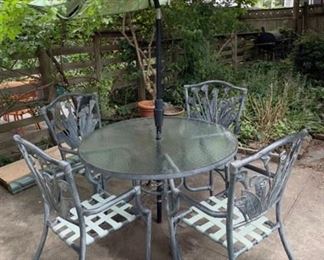 
Patio Set: Glass Table, 4 Chairs & Umbrella
Lot #: 34