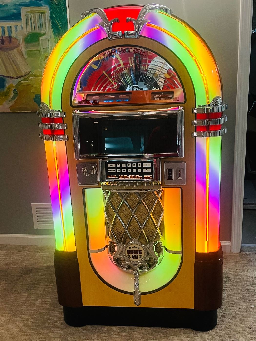 90s Rowe-AMI CD Jukebox, awesome looks and sounds great. 250 watt amp, holds 100 CDs, even has bubbling tubes. Super cool and great quality