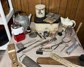 Antique country utensils, ice grinder, tin breadbox, vintage tea pot and halls tea pot 