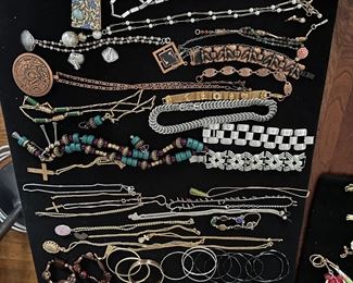 More assorted necklaces, bracelets and earrings