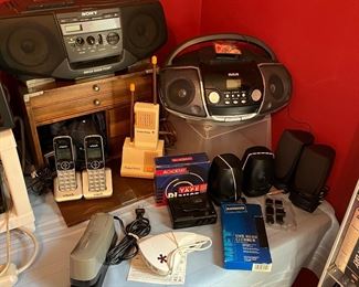 Sony and RCA boom boxes, V tech phones, computer speakers, electric stapler, fisher price walk-in talkie and Dazzle 