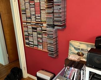 Large variety of cassette tapes, DVD’s, paper shredder and digital scale.