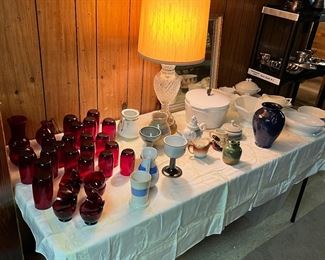 Cranberry glass,  iron bean pot, ceramics and milk glass 