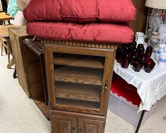 Stereo cabinet on wheels and matching set of large pillows