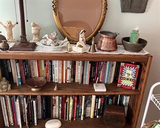 Lamp, oval frame with glass, collectibles, books and bookcase
