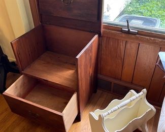 Antique liquor cabinet opened and magazine rack