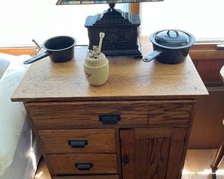 Antique washstand, enamelware and Tiffany shaded lamp