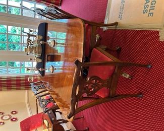 Beautiful Henredon Natchez banded formal dining room table and ball and claw chairs.