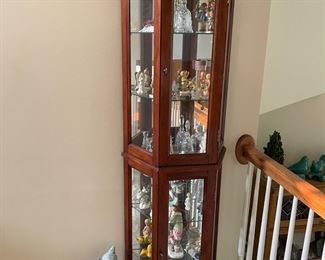 . . . this CURIO cabinet is for sale and stuffed with treasures