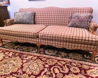 A beautiful French Provincial sofa with updated upholstery 