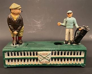 Vintage cast iron mechanical bank........To register in order to place bids go to www.capitolsalesservices.hibid.com